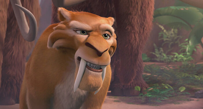 Saber-toothed tiger character from animation, representing unconventional crushes people actually have in a jungle setting.