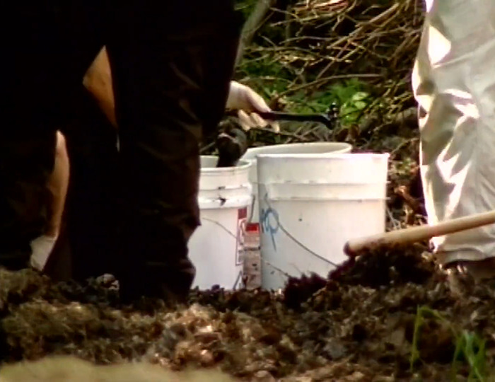 Investigators at suspected serial killer&rsquo;s farm digging to find 10th body, victim missing since 1993, outdoor crime scene.