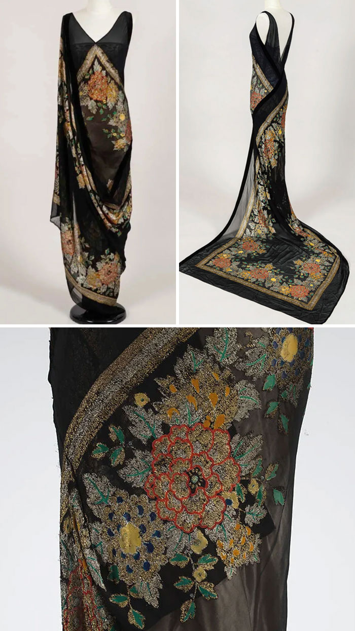 Black sheer vintage gown with intricate floral embroidery, showcasing a few centuries of fashion in elegant textile design.