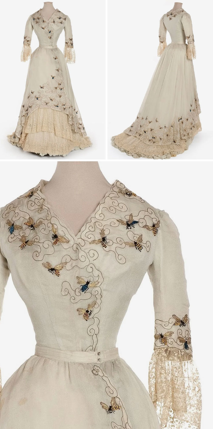 Vintage fashion dress with intricate bee embroidery and lace details, showcasing centuries of fashion history in minutes.
