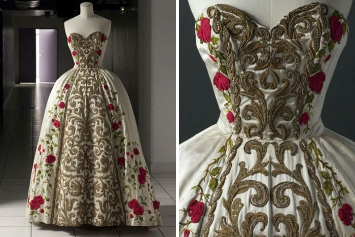 Vintage embroidered ball gown with floral and gold detailing, showcasing centuries of fashion evolution in an elegant design.