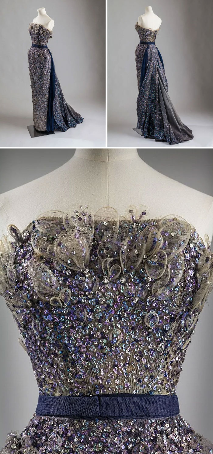 Elegant embellished evening gown on mannequin showcasing centuries of fashion with intricate sequins and fabric details.