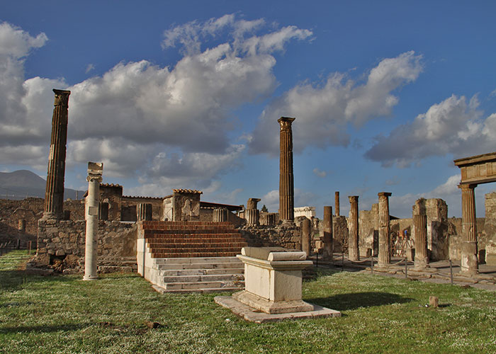 Ancient ruins under a partly cloudy sky, a popular site for research on past historical events and discoveries.