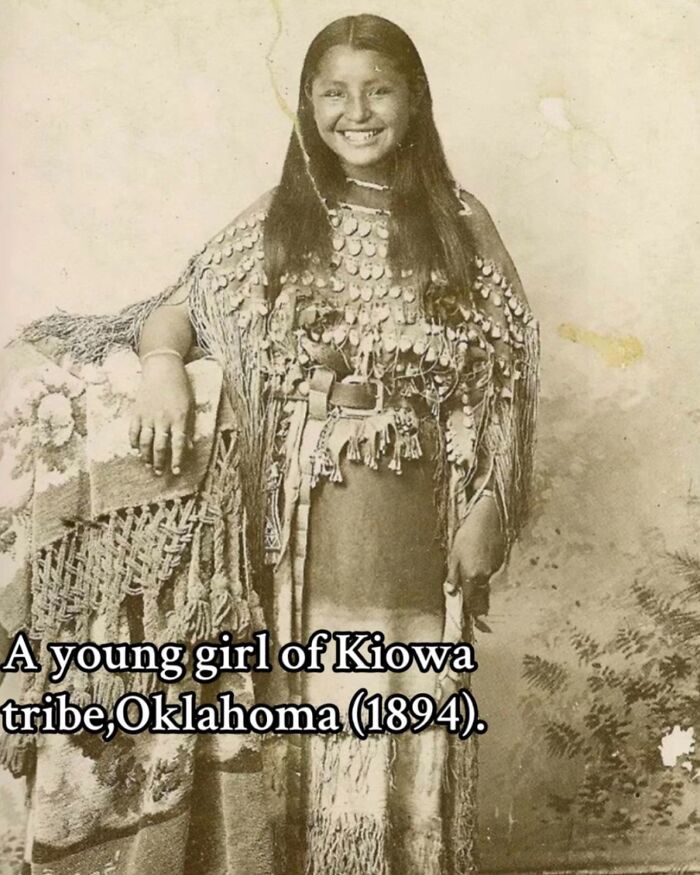 Young Kiowa tribe girl in traditional dress, Oklahoma 1894, a monumental life moment frozen in history.