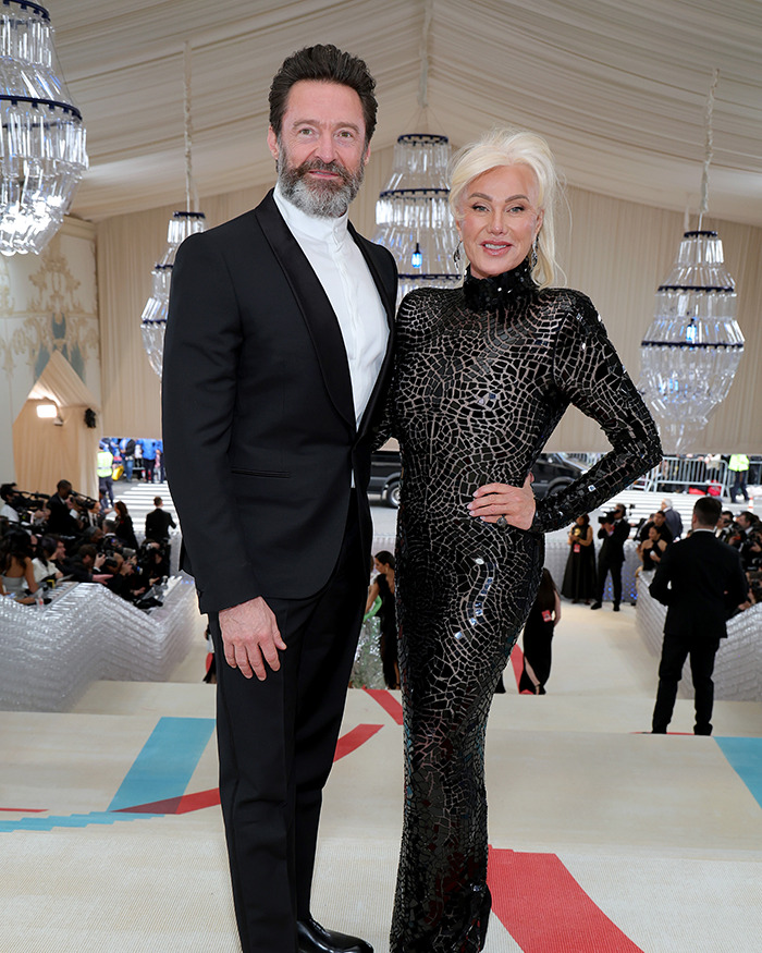 Hugh Jackman and Sutton Foster posing together at a formal event, highlighting their high-profile romance. Hugh Jackman and Sutton Foster posing together at a formal event, highlighting their high-profile romance.