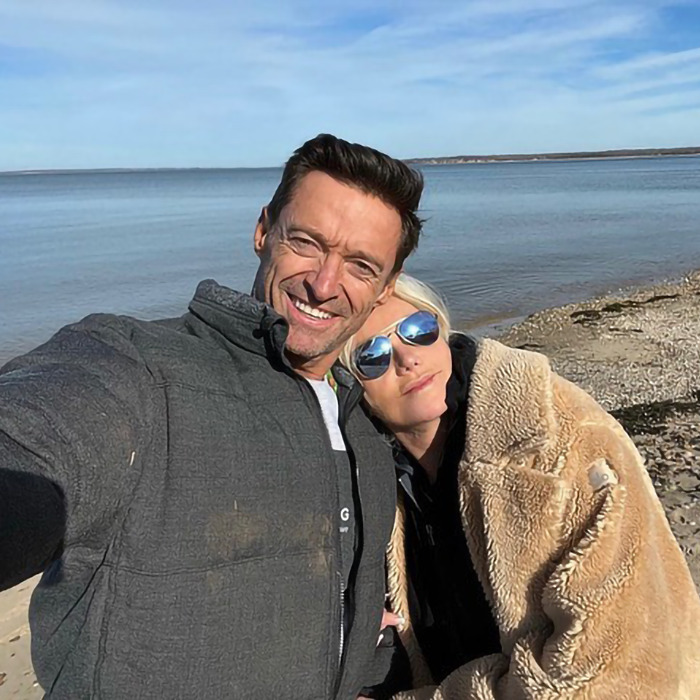 Hugh Jackman and Sutton Foster taking a selfie together outdoors by the water during a casual, chilly day. Hugh Jackman and Sutton Foster taking a selfie together outdoors by the water during a casual, chilly day.