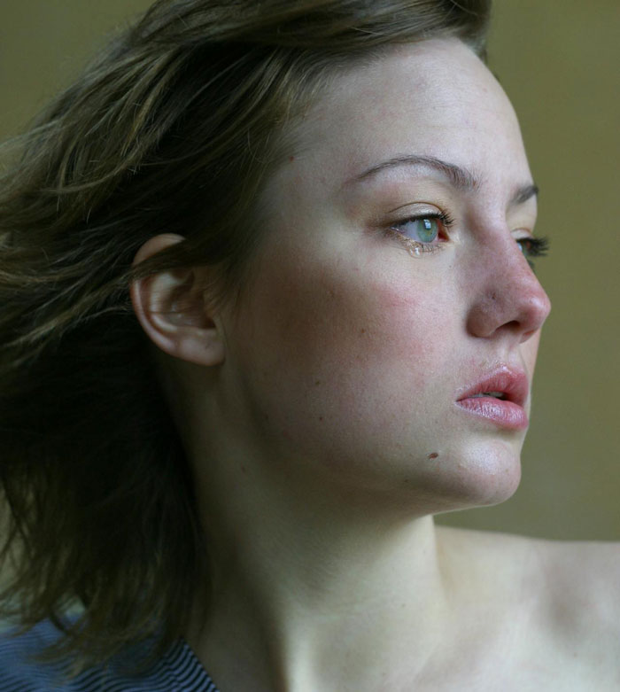 Sad woman with tear rolling down her cheek, reflecting on ending marriage after husband demands paternity test for teen son Sad woman with tear rolling down her cheek, reflecting on ending marriage after husband demands paternity test for teen son