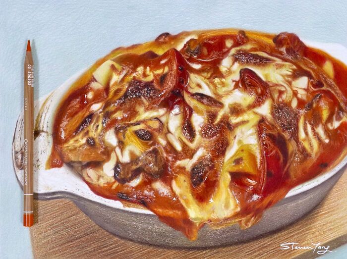 Realistic food illustration of a cheesy baked dish next to a colored pencil, showcasing Steven Tang’s deceptive artwork style.