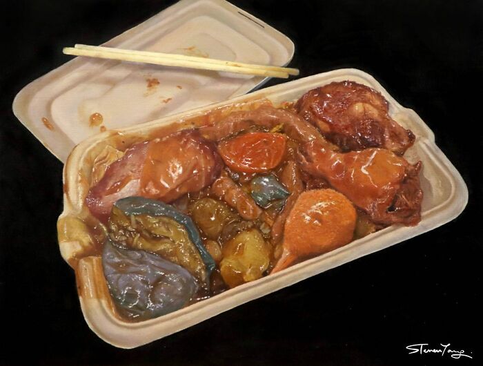 Takeout container with realistic food illustration including chicken drumsticks and vegetables, a deceptive food illustration by Steven Tang.