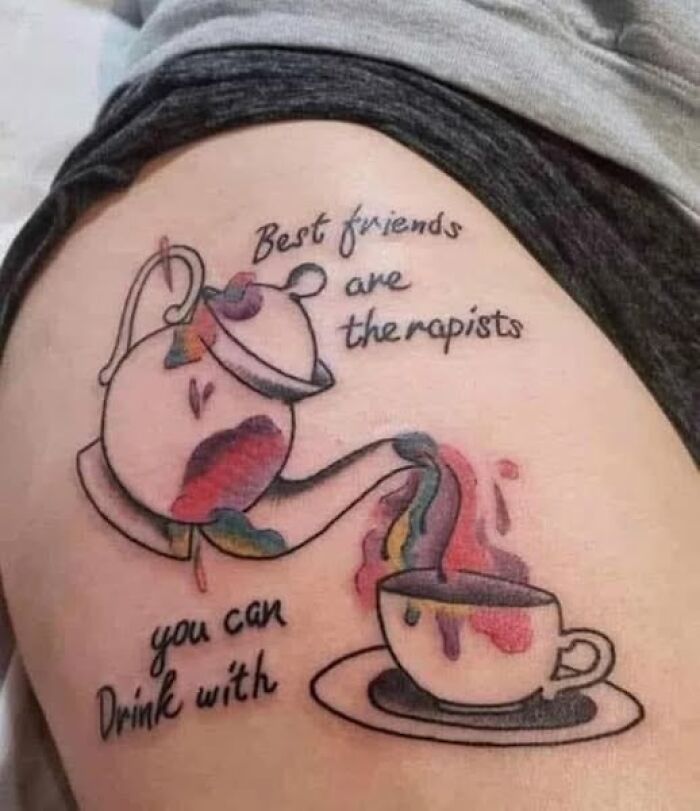 Tattoo with a teapot pouring colorful liquid into a cup, featuring a misspelled phrase, an example of inked permanent mistakes.