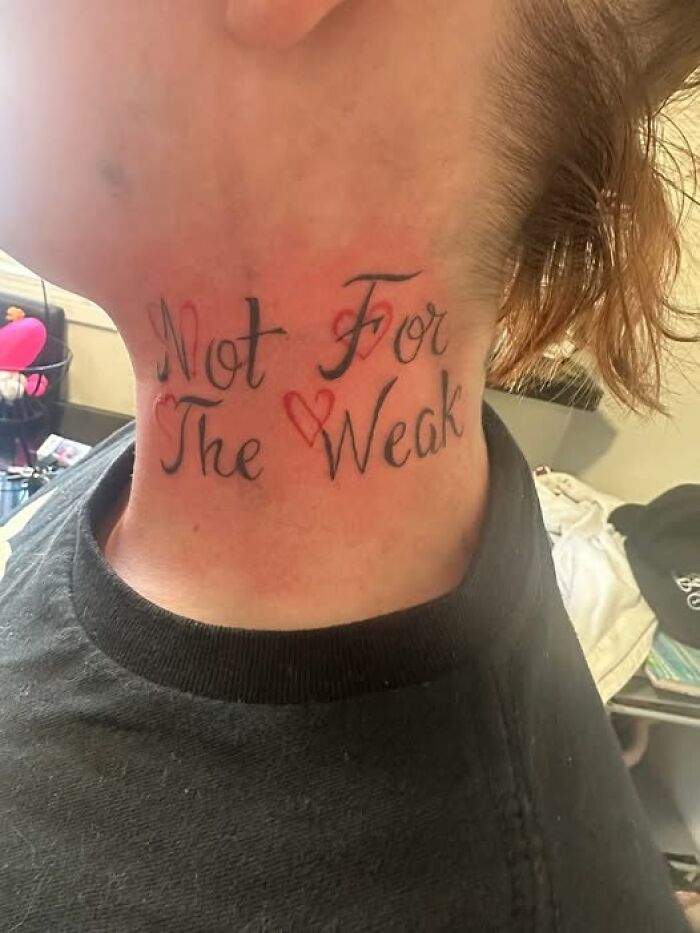 Neck tattoo saying Not For The Weak with decorative hearts, showing a permanent mistake in inked design.