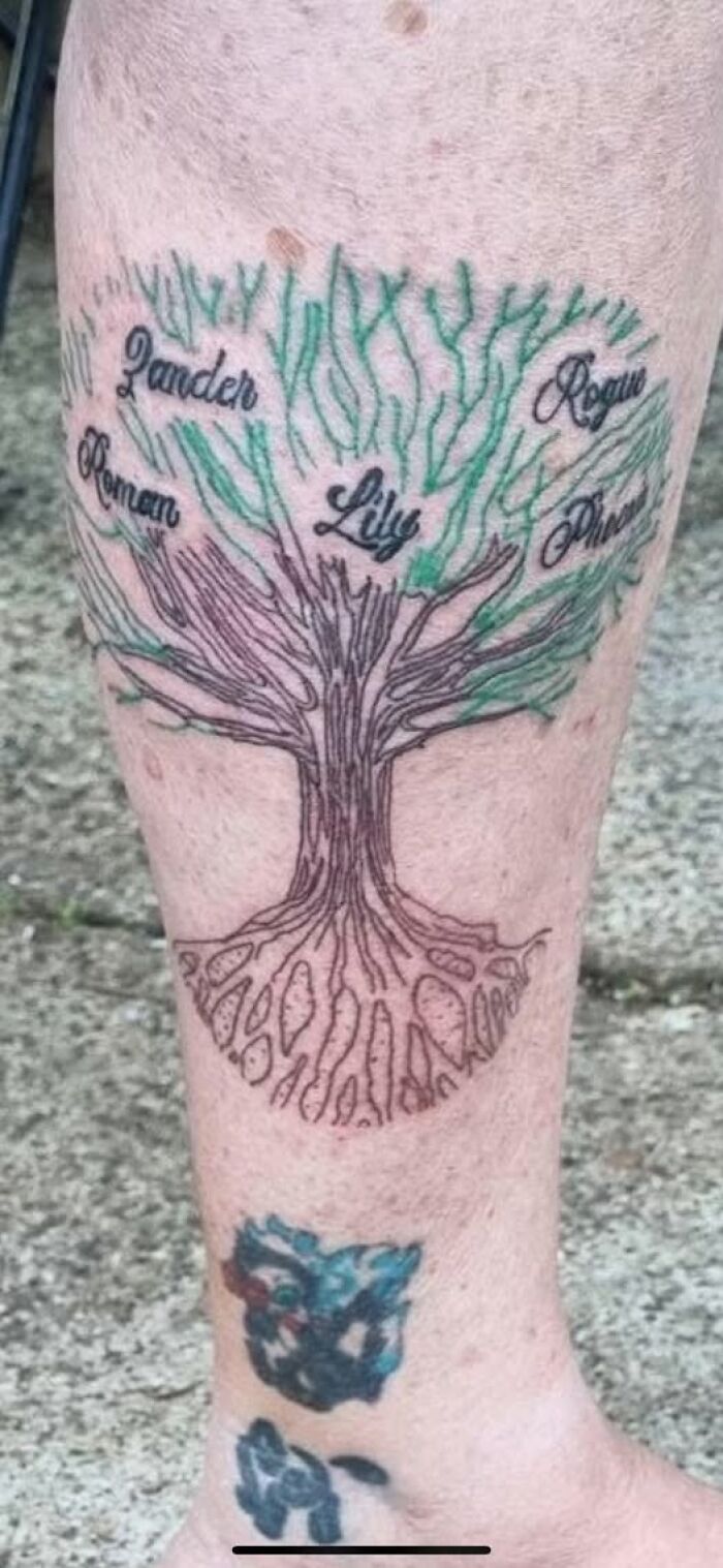 Tree tattoo with names inked on leg showing a permanent mistake in a cool tattoo design.