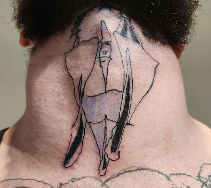 Abstract neck tattoo with unclear design showing a permanent mistake in inked body art.
