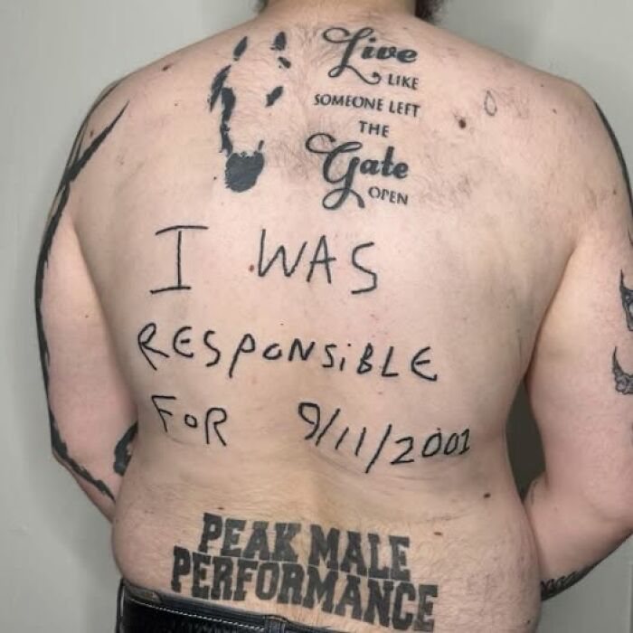 Man’s back covered with multiple tattoos including a misspelled quote and a controversial permanent mistake tattoo.