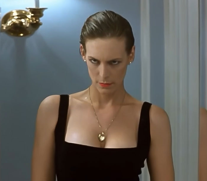 Jamie Lee Curtis in a black dress with a gold heart necklace, recalling plastic surgery prompted by an embarrassing remark. Jamie Lee Curtis in a black dress with a gold heart necklace, recalling plastic surgery prompted by an embarrassing remark.