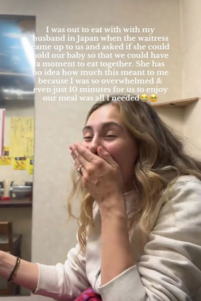 Woman overwhelmed with emotion after Japanese waitress helps traveling mom and dad in restaurant, capturing viral internet moment.