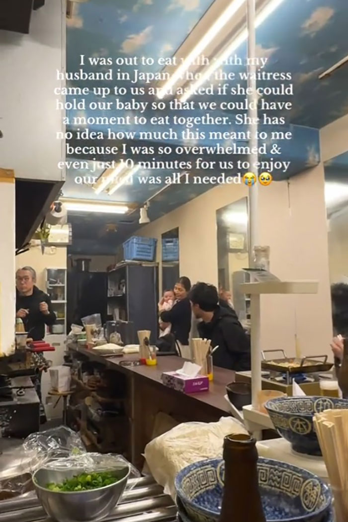 Japanese waitress helping a traveling mom and dad in a small restaurant, creating a viral heartwarming moment.