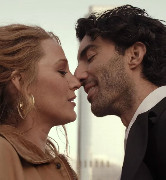 Blake Lively close to a man in a tender moment, related to Taylor Swift blackmail and personal texts leak news.