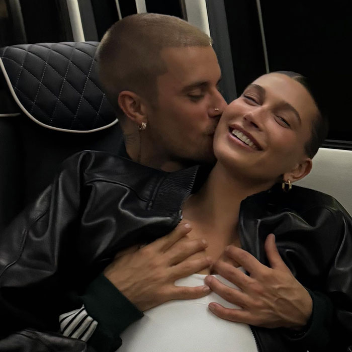 Justin Bieber with partner in affectionate moment, sparking a fiery parenting debate over smoking during holiday.