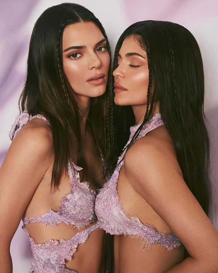 Kylie Jenner and Kendall Jenner posing in matching lavender outfits highlighting Kylie Jenner&rsquo;s net worth update.