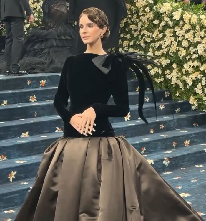 Woman in elegant black and brown gown at Met Gala 2025, showcasing dramatic weight loss sponsored by Ozempic.