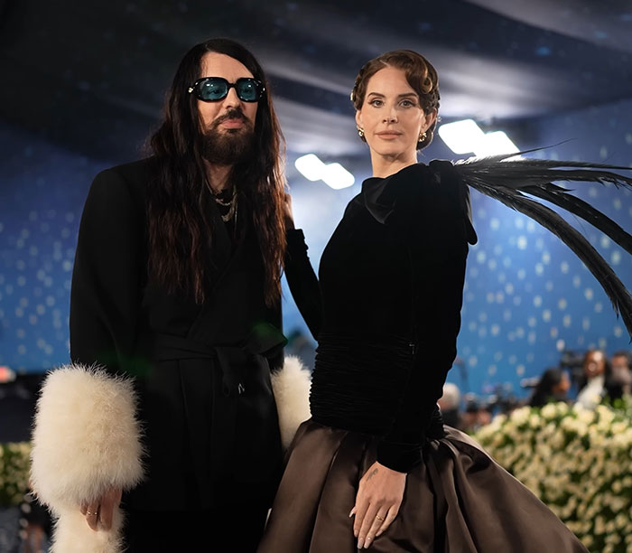 Man and Lana Del Rey posing at Met Gala event, highlighting massive thirst over guy in Lana Del Rey Met Gala photo.