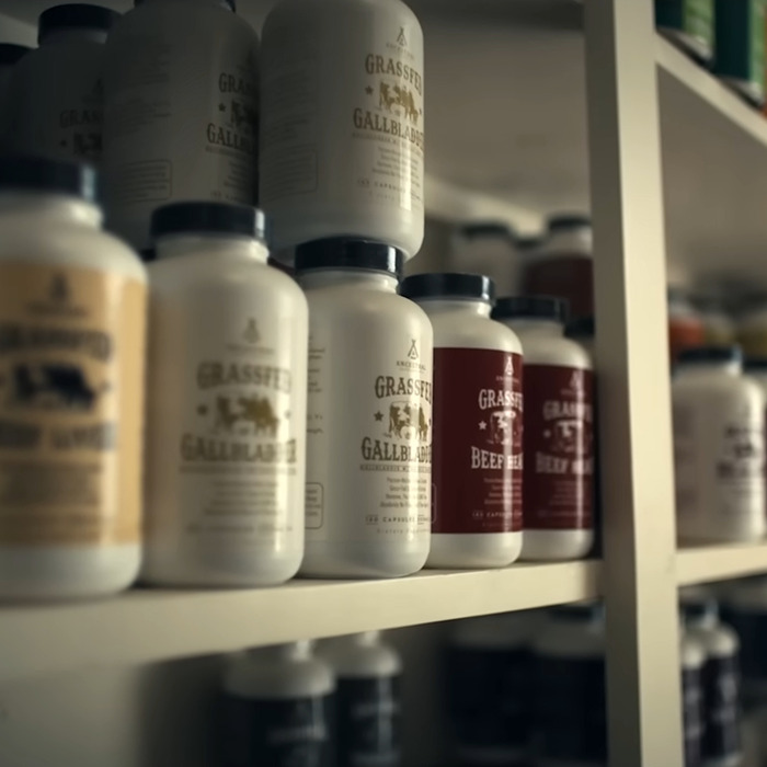 Bottles of supplements on a shelf related to raw animal diet promoted by Liver King revealed in new doc. Bottles of supplements on a shelf related to raw animal diet promoted by Liver King revealed in new doc.