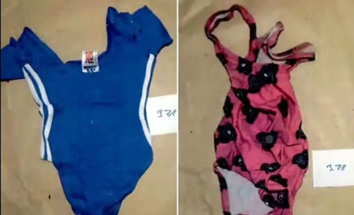 Two small swimsuits laid flat on a surface, related to Madeleine McCann suspect evidence in the case.