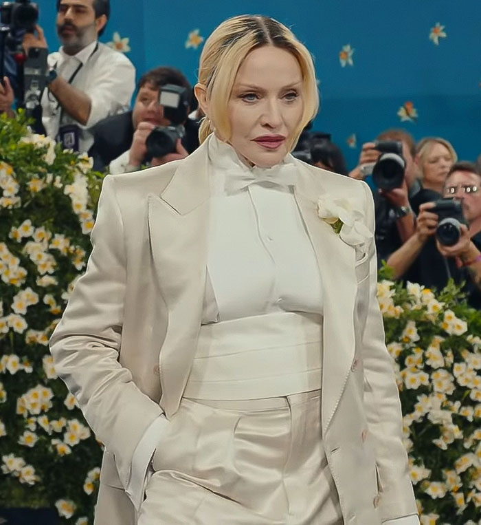 Madonna in an ivory suit at an event, fans notice her famous facial gap is missing in recent appearance