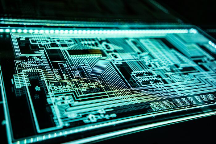 Close-up of a digital circuit board with illuminated pathways representing a major event happening today not covered by mainstream media.