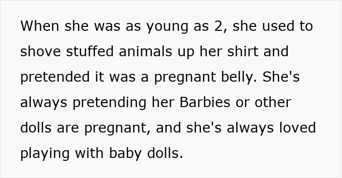 Child pretending to be pregnant with stuffed animals, showing pregnancy obsession from a six-year-old girl.