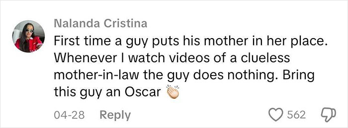 Comment praising a man who pushes his mom away during a baby's gender reveal, sparking a heated debate online.