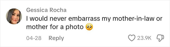 Comment from woman reacting to man pushing mom away during baby's gender reveal, sparking a heated debate online.