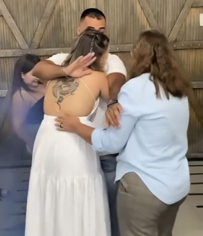 Man pushes mom away during baby gender reveal celebration with wife, causing tension among family members at event.