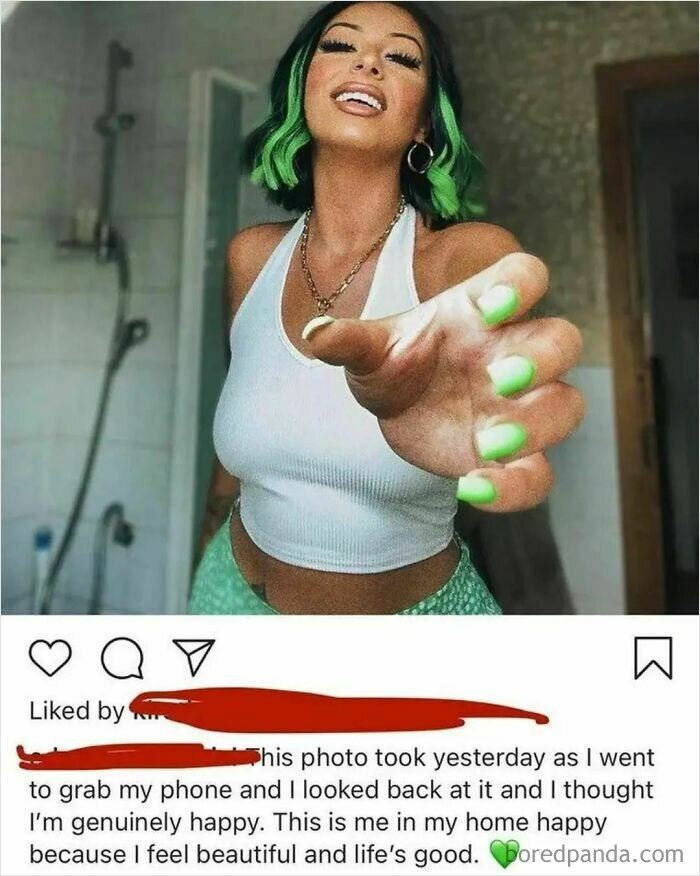 Young woman with green highlights and matching nails posing with a selfie in a bathroom, illustrating obvious lies people tried to pass off.