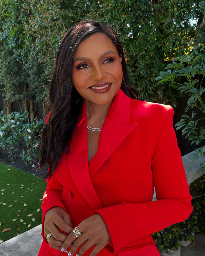 Mindy Kaling in a red blazer showing off slim figure outdoors amid Ozempic rumors at an event. Mindy Kaling in a red blazer showing off slim figure outdoors amid Ozempic rumors at an event.