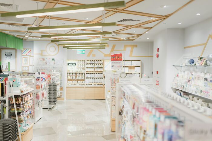 Bright clean store interior with shelves displaying various products illustrating mundane things that make people sick.