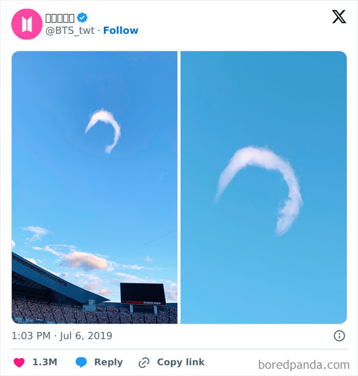 Rare natural phenomena captured in the sky showing an unusual curved cloud formation over a stadium during daytime.
