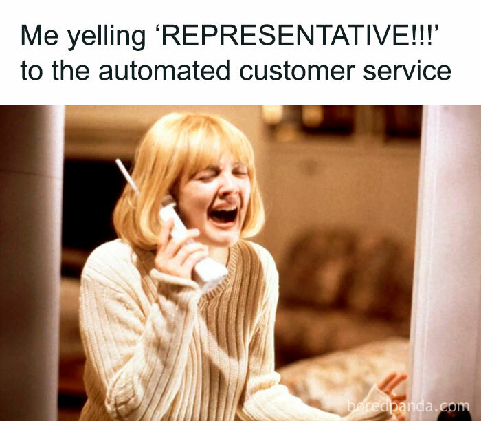 Woman with blonde hair yelling into a retro cordless phone, capturing 90s nostalgia and millennial life humor in an indoor setting.