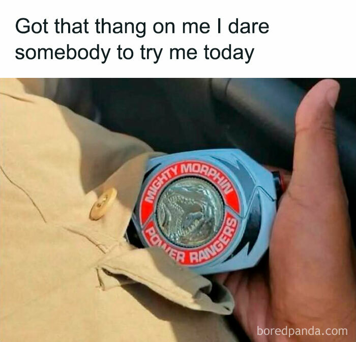 Hand holding a Mighty Morphin Power Rangers toy belt, a cool meme hinting at 90s nostalgia for millennials.