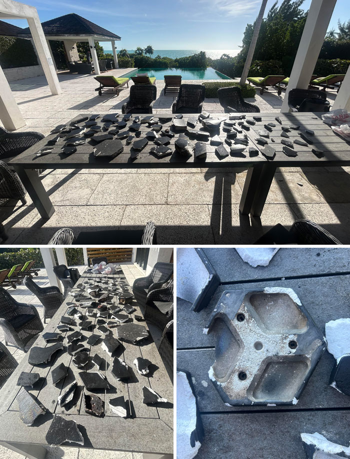 Broken black tiles arranged on a table outdoors by the pool, reflecting current life in the US through the eyes of Americans.