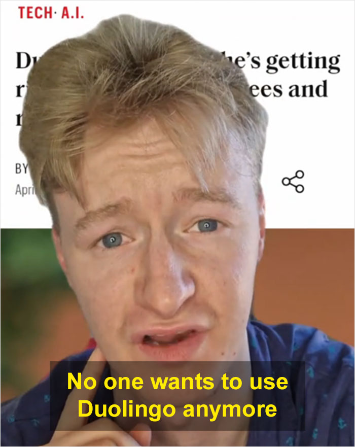 Young man with concerned expression reacting to Duolingo's AI-first strategy pushing many users away. Young man with concerned expression reacting to Duolingo's AI-first strategy pushing many users away.