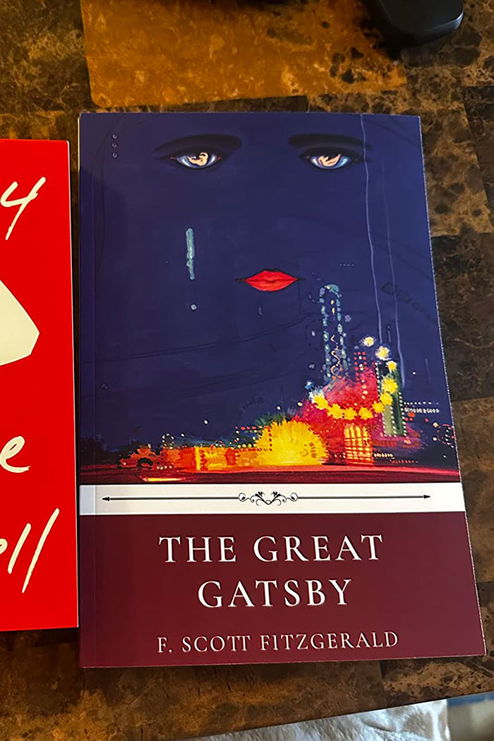 The Great Gatsby book cover with abstract eyes and city lights, featured in excellent books recommended by readers online.