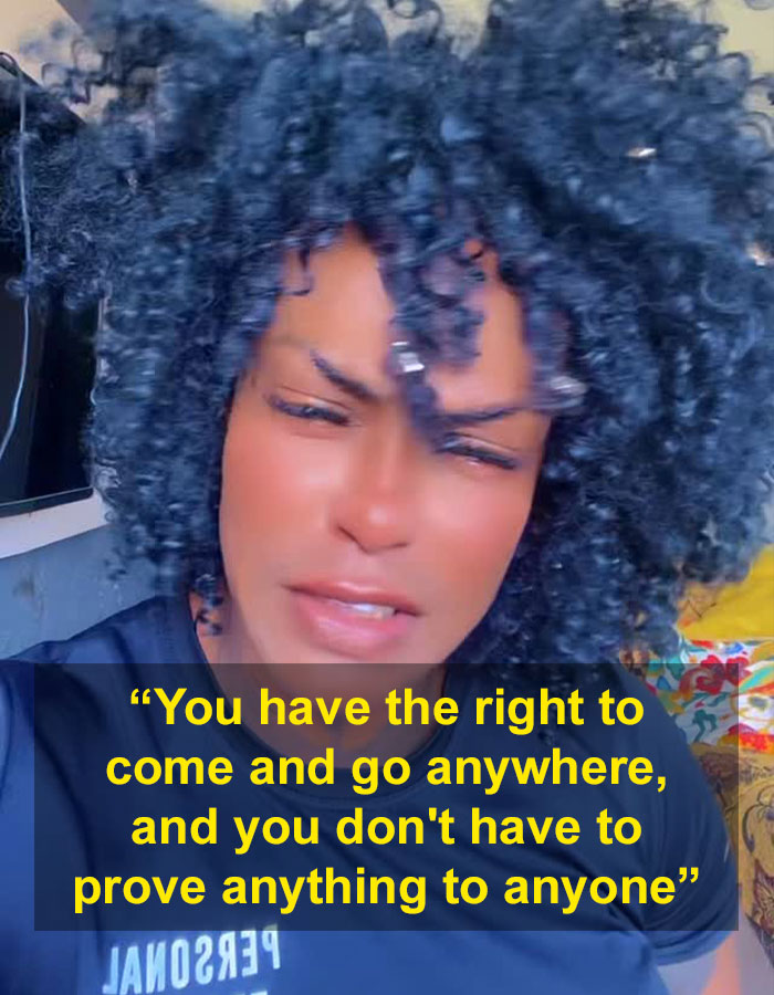 Person with curly hair speaking in a video about rights after couple blocked cis woman from gym bathroom.