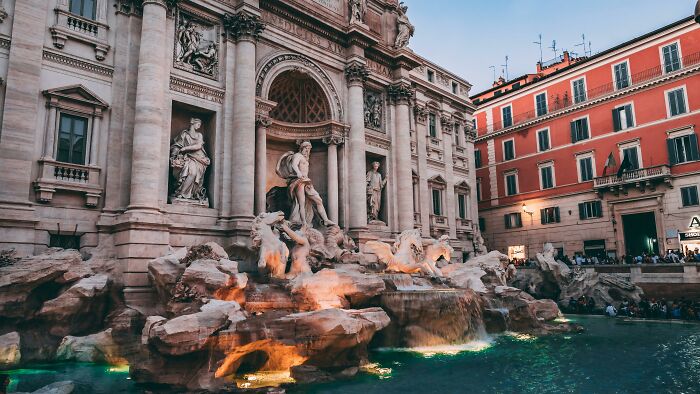 Famous European city fountain with classical sculptures and historic buildings, ideal for a cities around the world quiz.