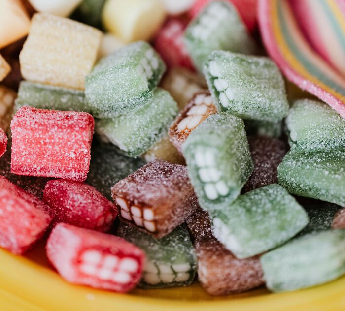 Close-up of colorful sugar-coated candies in a bowl, illustrating wild cooking opinions and internet food thoughts.