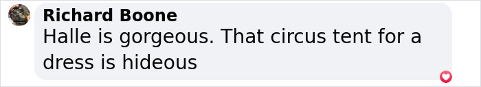 Comment from Richard Boone praising Halle Berry's appearance and criticizing a dress as hideous. Comment from Richard Boone praising Halle Berry's appearance and criticizing a dress as hideous.