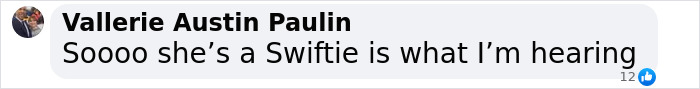 Comment saying Soooo she&rsquo;s a Swiftie in a Facebook post, with profile picture of a woman and visible name.