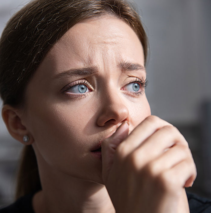 Worried woman planning a vacation with her boyfriend looks anxious and uncertain just before their flight.