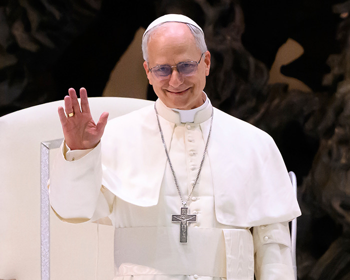 The Pope smiling and waving, delivering a menacing message to the United States that is going viral.